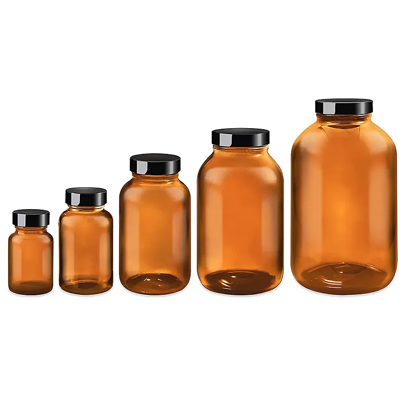 Bottles 1 Five amber glass jars in sizes
